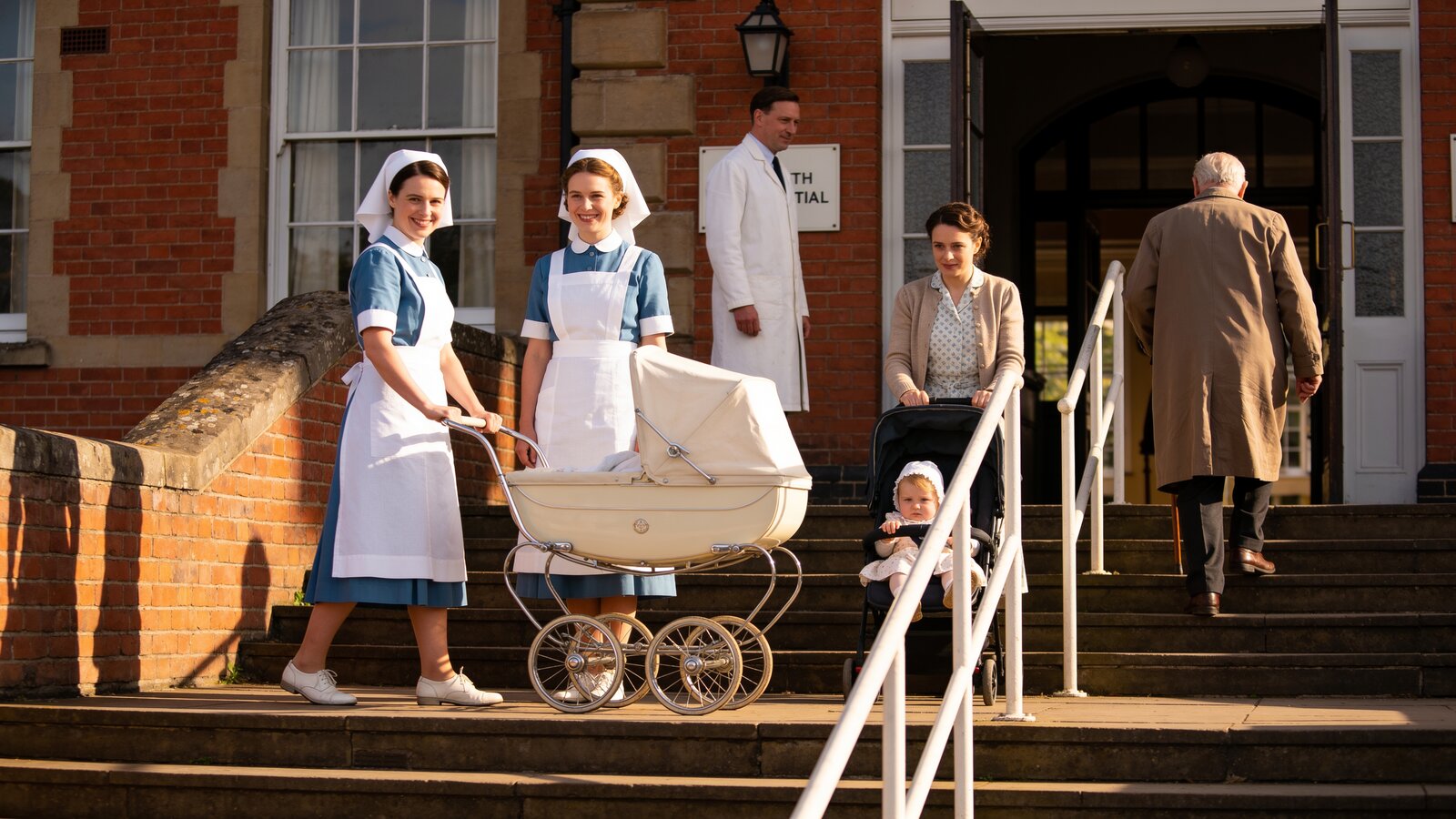 Illustration: nurses, a doctor and patients at the entrance of a red-brick British hospital in the 1940s